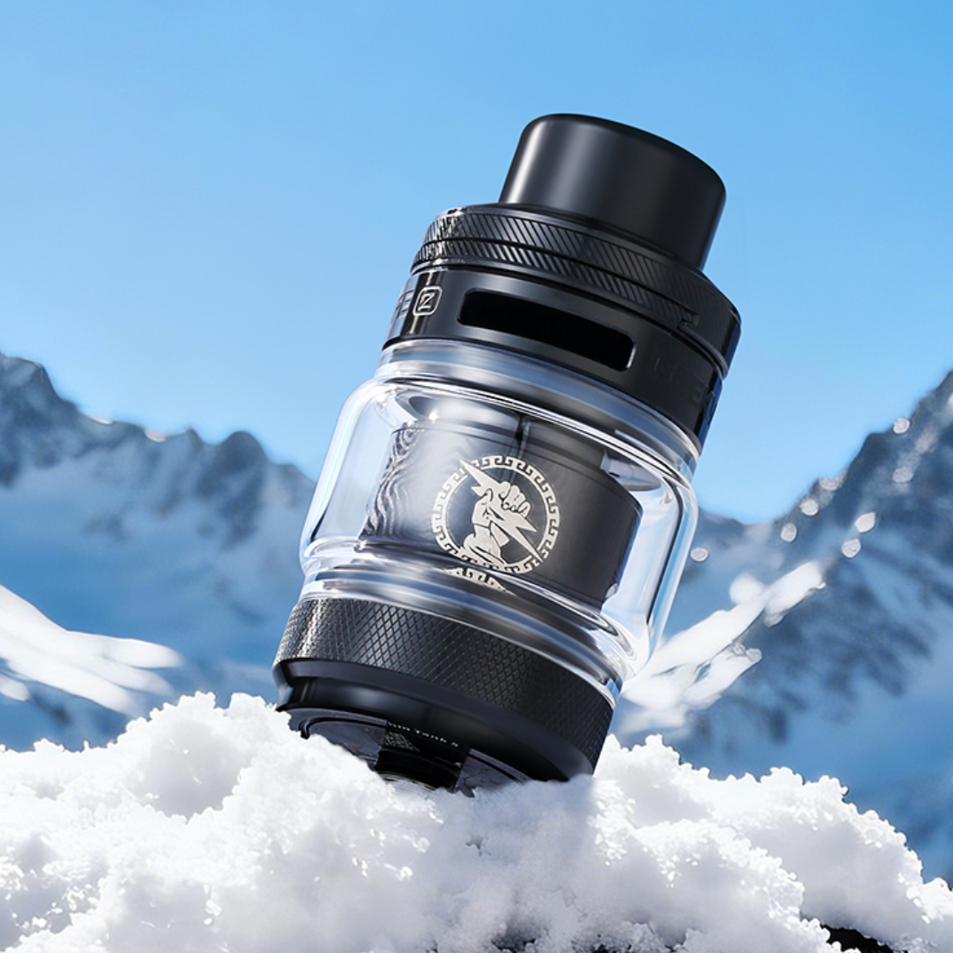 Geekvape Z Subohm Tank 5   with branding in the snow, mountain background