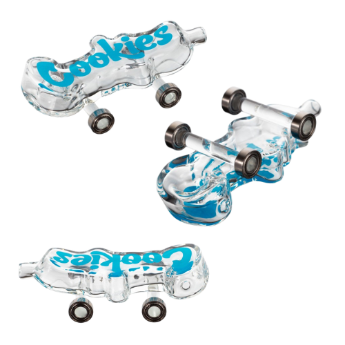 Cookies Toke Deck - Clearn | Discover the ultimate smoking experience with the Cookies Toke Deck Hand Pipe. This exquisite piece not only serves as a mini-skateboard, but also features metal wheels for added functionality. Elevate your senses and showcase your unique style with this one-of-a-kind smoking pipe.