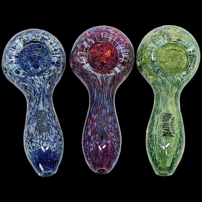 Three colorful glass smoking pipes on a white background